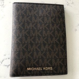 Brand new, no tags. Michael Kors passport & card holder. Unused. 4.5” x 5.5”